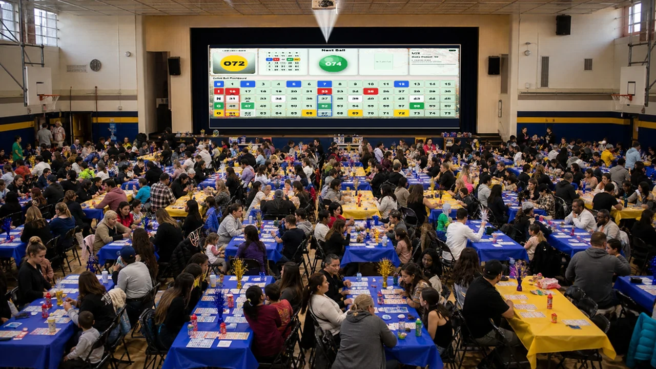 Large school fundraiser bingo night with a real spring Lucky Squares number flashboard projected above the crowd